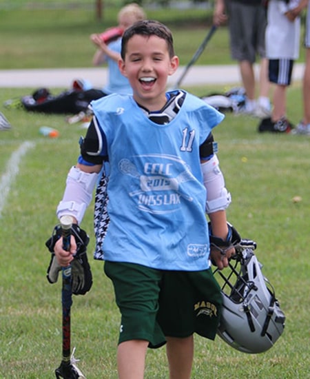 One of our youngest Stelzer Dental patients playing football while wearing his Moutg Guards