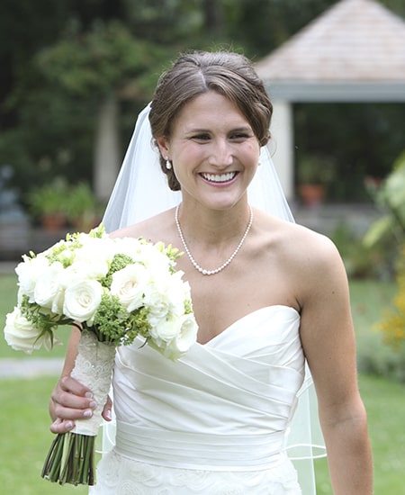 One of our Stelzer dental patients showing off her new smile at her wedding